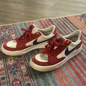 Maroon white and Blue Nike SB 
W6